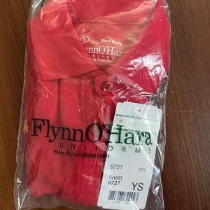 Kids uniform Polo shirt with Faith West embroidered logo.